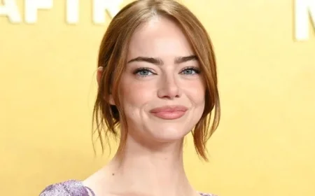Emma Stone’s Red Carpet Cardigan Sparks Heated Online Debate