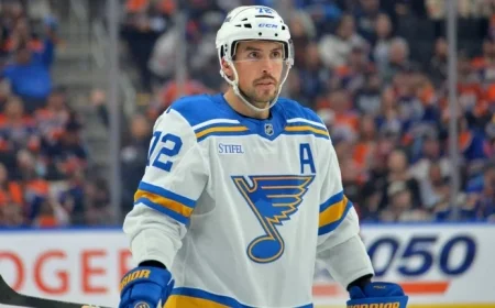 Detroit Acquires Faulk in Trade for Picks, Players