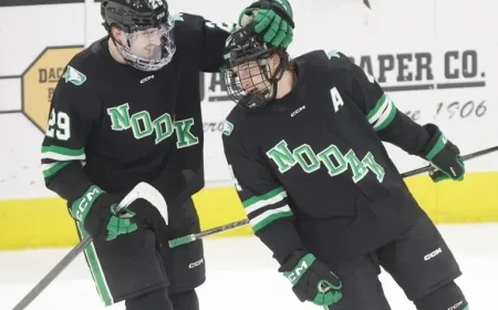 Bennett Schimek Watches UND’s Jake Livanavage Join an Elite All-NCHC Circle