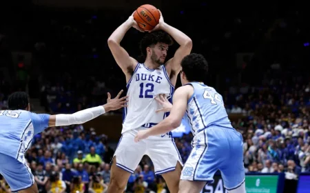 Carlos Boozer as awards roll in for Cameron Boozer after a breakout season