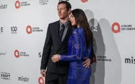 Dua Lipa Sends Pulses Racing in Plunging Blue Dress at Elton John’s Oscars Viewing Party — A Closer Look