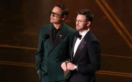 Doomsday buzz hits the Oscars as Downey Jr. and Evans reunite onstage