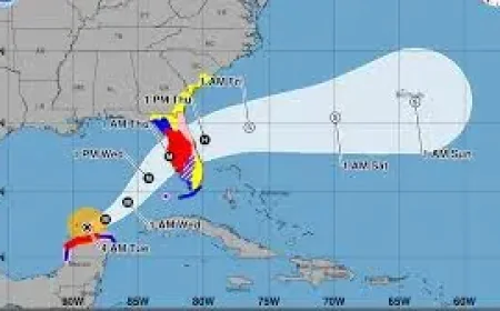 National Hurricane Center forecast cone shifts as inland alerts are added