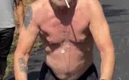 John Mellencamp Tour training, with a cigarette and a hill, has fans staring twice