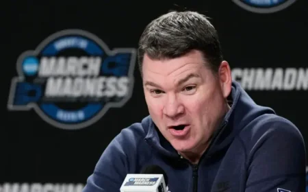 Arizona Basketball Coach Tommy Lloyd downplays UNC chatter — even as buyout and budget stakes loom