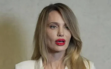 Angelina Jolie Stuns Pairing a Bold Bright Red Lip With a Silky White Wrap Dress — A Tom Ford Moment Recast