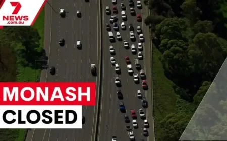 Monash Freeway closed after serious crash as biker fights for life