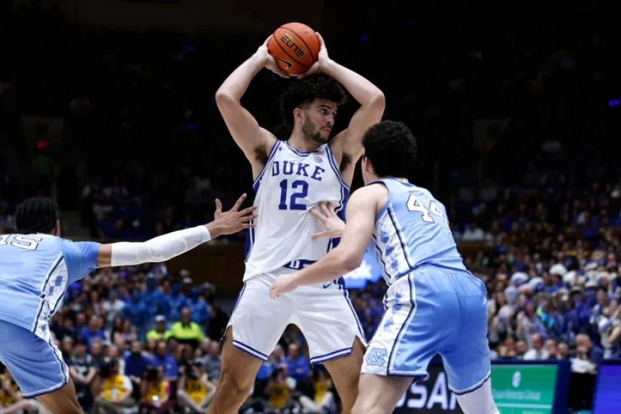 Carlos Boozer as awards roll in for Cameron Boozer after a breakout season