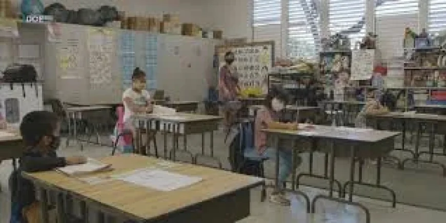 School Closings in Hawaii: A Friday Storm Shuts Campuses, and a Pedestrian Hurries Through the Downpour