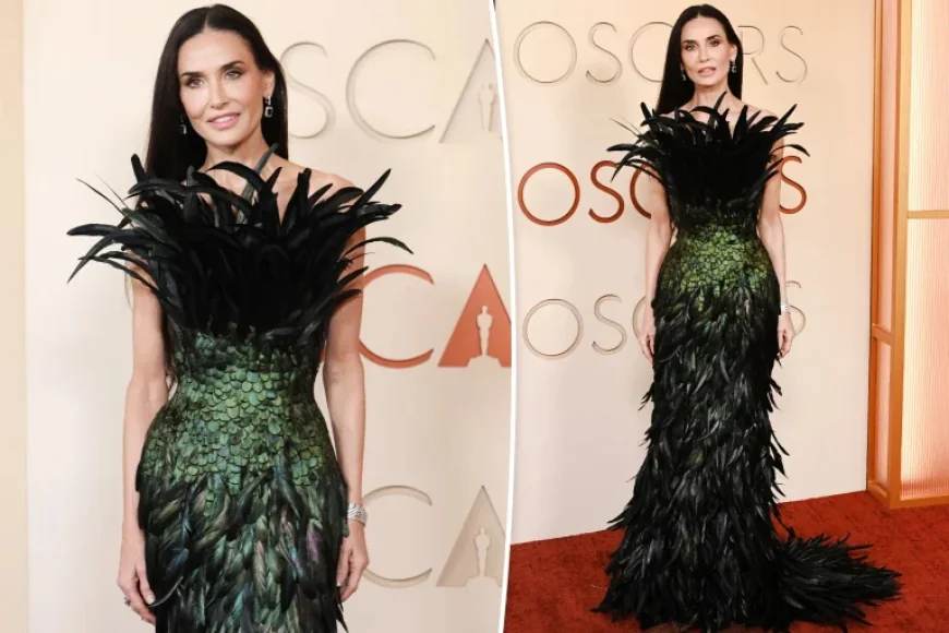 Demi Moore goes full peacock in feathered fashion on Oscars 2026 red carpet
