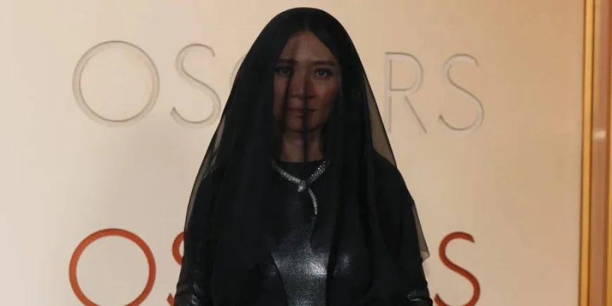 Hamnet Director Chloé Zhao steps onto the Oscars red carpet in black veil as nominations and setbacks collide