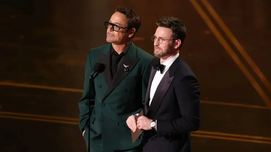 Doomsday buzz hits the Oscars as Downey Jr. and Evans reunite onstage
