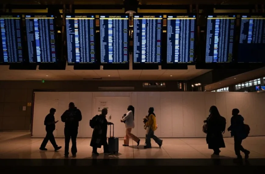 Denver Airport delays turn a night of snow into a day of hard choices for stranded travelers