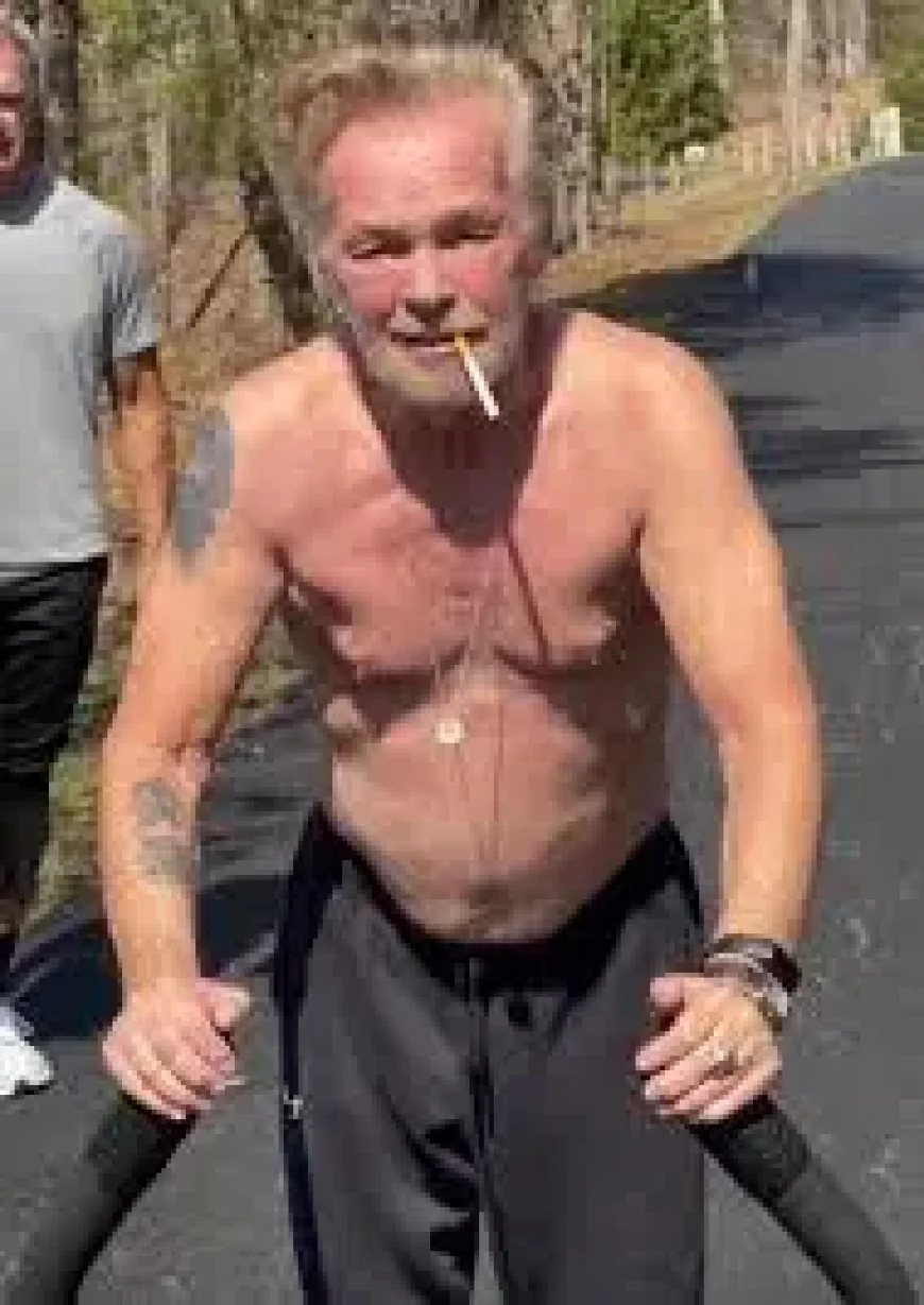 John Mellencamp Tour training, with a cigarette and a hill, has fans staring twice