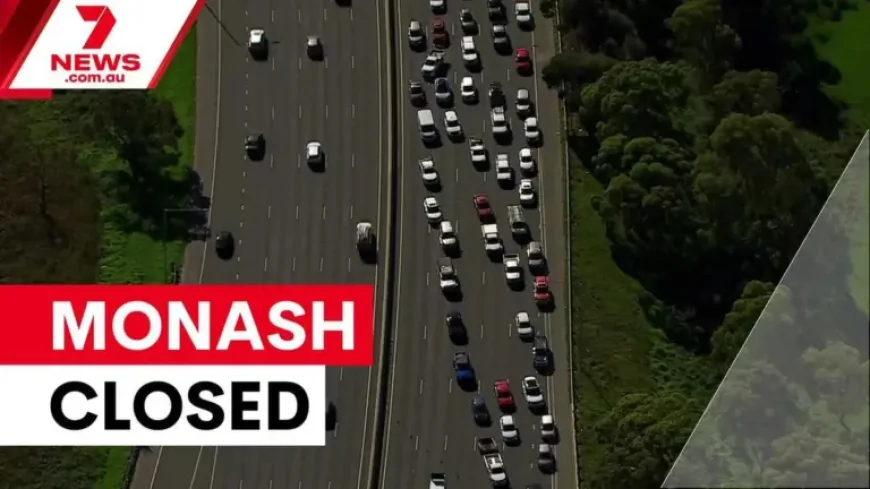 Monash Freeway closed after serious crash as biker fights for life