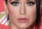 Katy Perry Baffles Fans with Unusual Rome Fountain Gesture