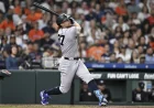 Max Schuemann watches Stanton leave with right calf tightness