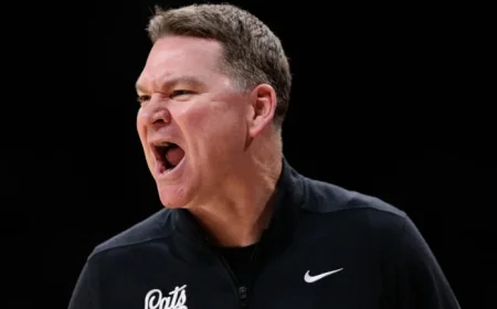 Tommy Lloyd Jokes About Fashion Mishap in UNC Colors