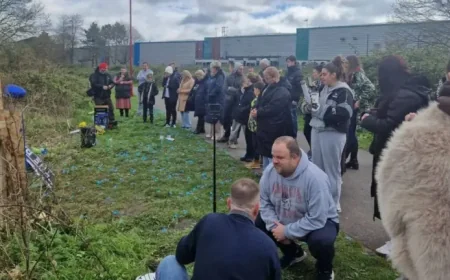 Paul Pike: Balloon Tribute and Wreaths Mark a Community’s Search for Answers