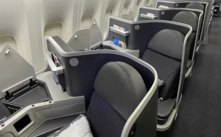 Robert Isom and Doug Parker Fly American Business Class from Paris