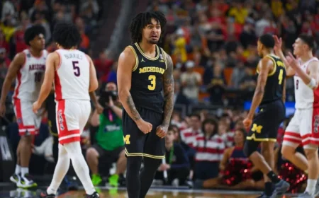 Michigan Faces Controversy Amid Defector Accusations