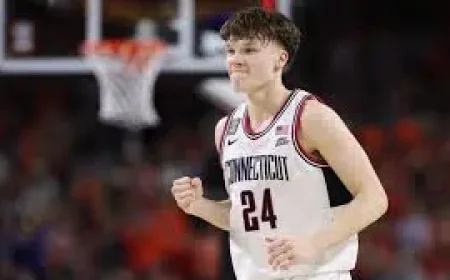 Chris Mullin: UConn family roots turn against Michigan in title game