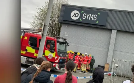 Jd Gym Bury: 2 injured after car ploughs into building in shocking evening crash