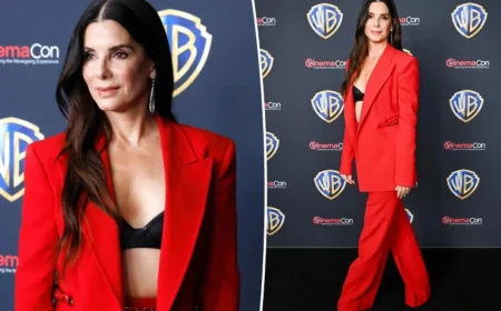 Sandra Bullock Stuns in Bold Red Pantsuit at CinemaCon 2026 Red Carpet