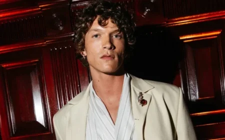 Connor Storrie Shines in Cream Suit at Tiffany Blue Book Gala