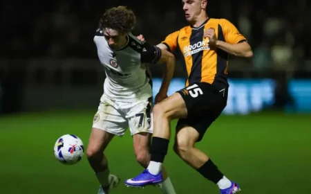 Andy Woodman and Bromley left to wait after Cambridge hold firm in promotion race