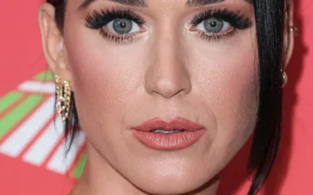 Katy Perry Baffles Fans with Unusual Rome Fountain Gesture