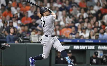 Max Schuemann watches Stanton leave with right calf tightness
