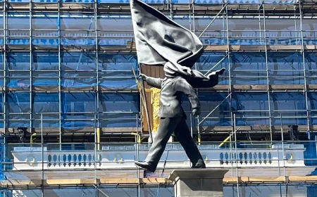Banksy Statue Appears on Waterloo Place in London