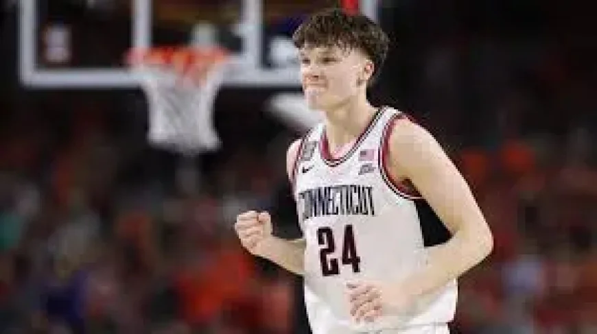 Chris Mullin: UConn family roots turn against Michigan in title game