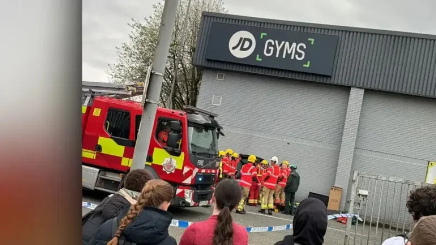 Jd Gym Bury: 2 injured after car ploughs into building in shocking evening crash