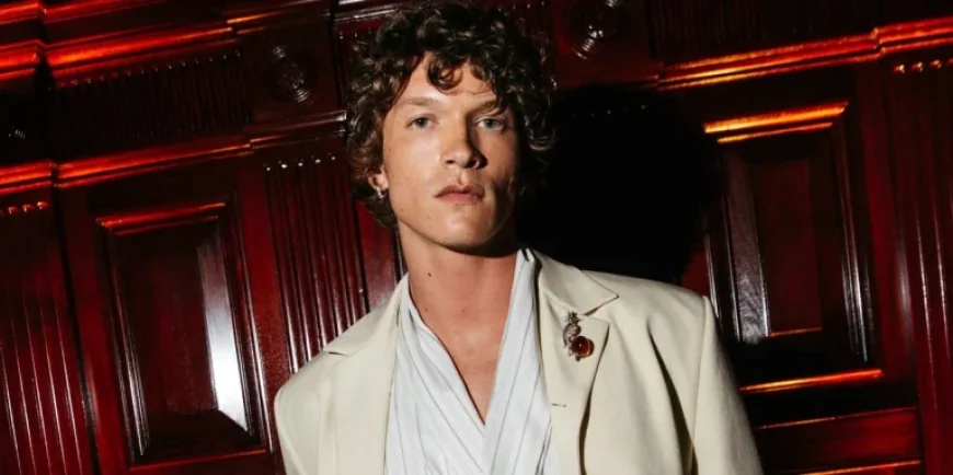 Connor Storrie Shines in Cream Suit at Tiffany Blue Book Gala