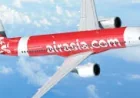 AirAsia Orders 150 A220s in Simple Flying's Record Deal