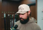 Zach Bogosian chats pregame before Game 3 vs. Colorado