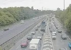 M60 clockwise closed between junctions 22 and 23 after car blocks road