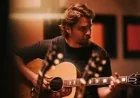 Luke Grimes says Outlaw Country led to his first recorded song