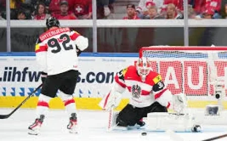 Austria beats Great Britain 5-2 with Peter Schneider double