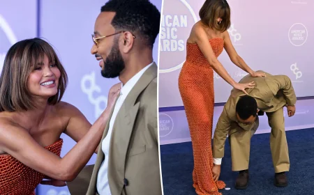 John Legend rescues Chrissy Teigen from May 25 AMAs dress snag