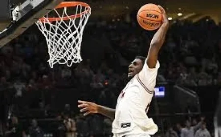Meleek Thomas waits as Billy Richmond returns to Arkansas