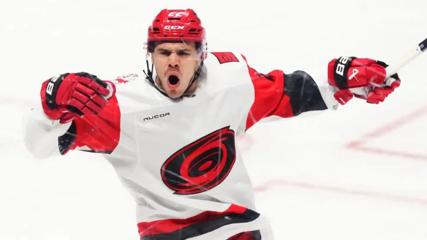 Carolina Hurricanes Players Push Past Flyers for 3-0 Series Lead