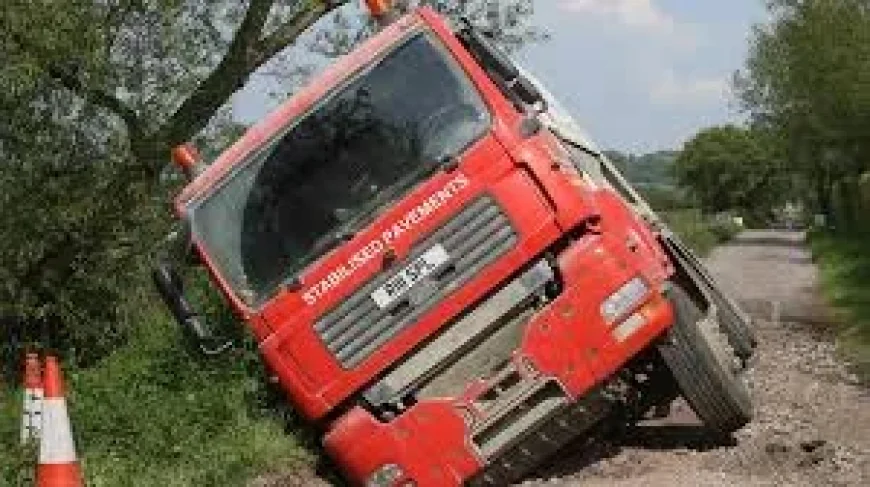 Somerset lorry stuck at near 45-degree angle on Butleigh Drove