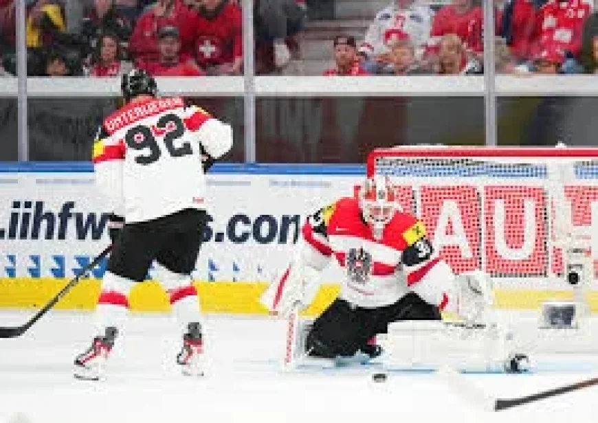 Austria beats Great Britain 5-2 with Peter Schneider double