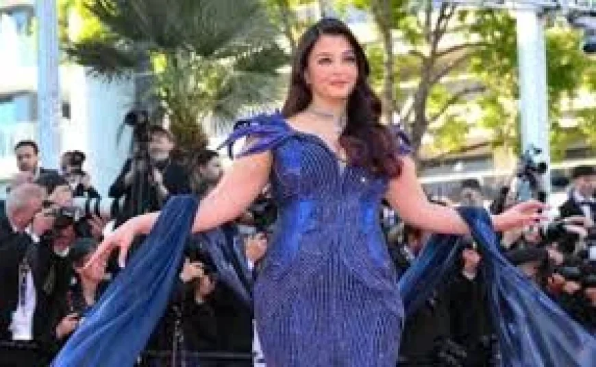 Aishwarya Rai Arrives in Cannes in Metallic Blue Dress