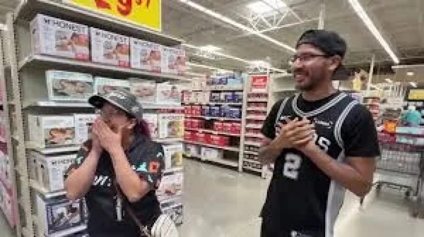 Sean Elliott Helps H-E-B Hand Out Free Groceries, Spurs Tickets