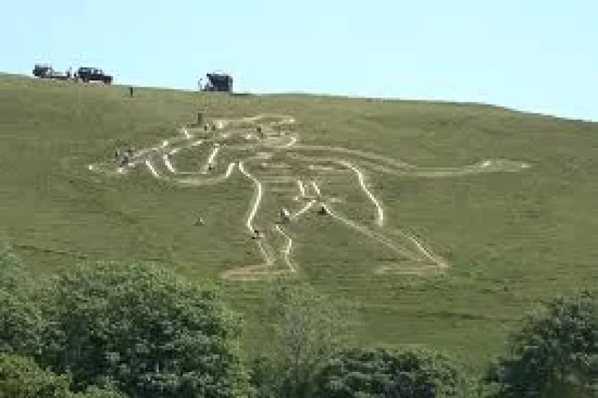 Volunteers use 17 tonnes of chalk at Cerne Abbas