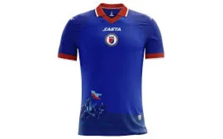 Danley Jean Jacques shows Haiti's plainer World Cup shirt